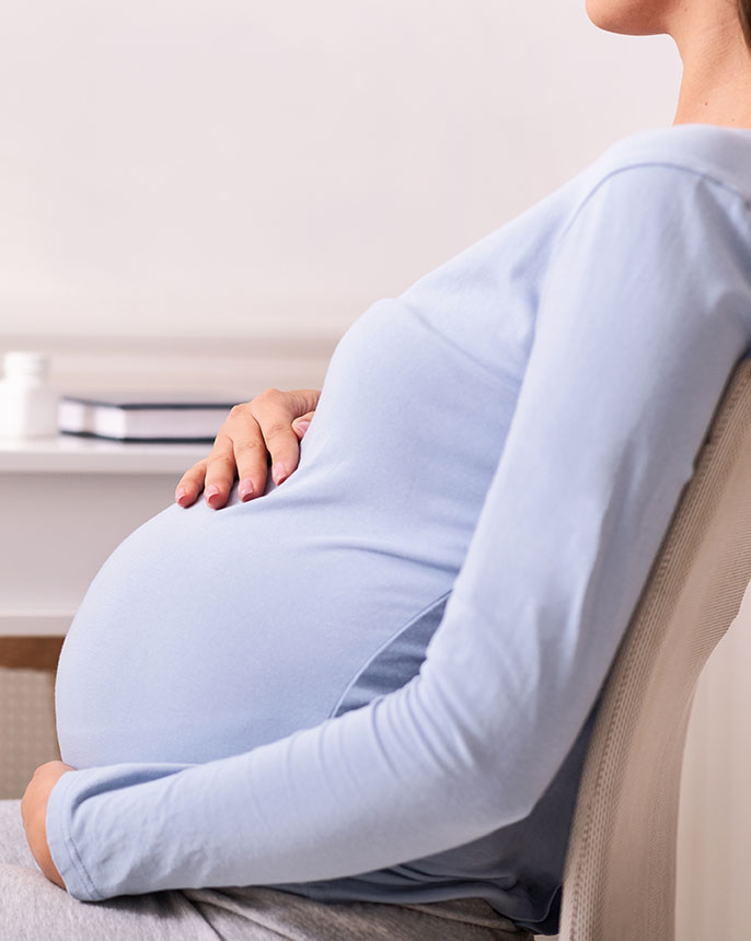 Unrecognizable Pregnant Lady Visiting Doctor In Office, Cropped